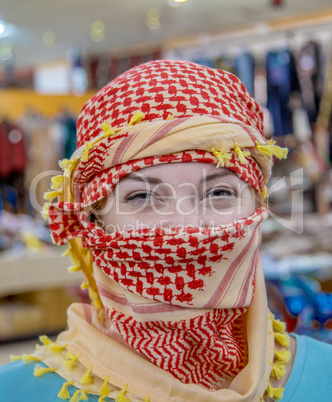 Girl of Slavic appearance wearing a headscarf Arab