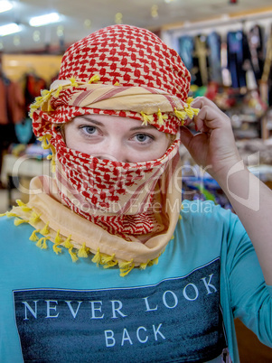 girl of Slavic appearance wearing a headscarf Arab