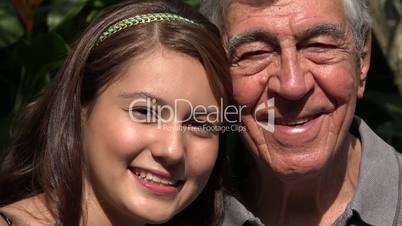 Smiling Teen Girl With Grandfather