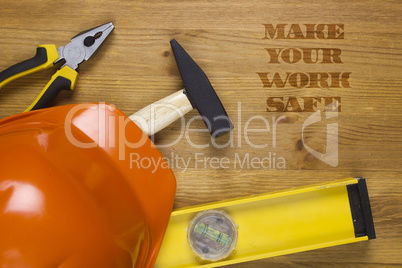 Construction concept with hard hat working tools