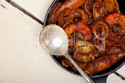 fresh seafoos stew on an iron skillet