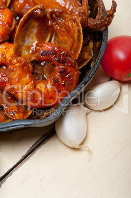 fresh seafoos stew on an iron skillet