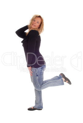 Middle age woman in jeans.