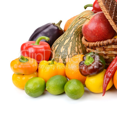 vegetables and fruits in a basket isolated on white background