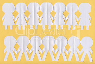 Paper people over yellow background