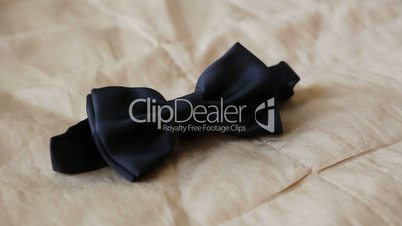 the groom takes a tie