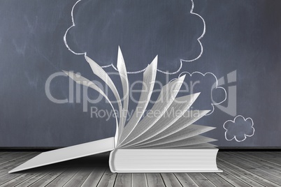 Open book against cloud on blackboard