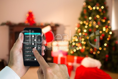 Man using home automation at christmas time