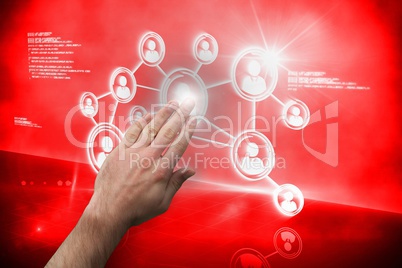 Hand touching interface on red screen