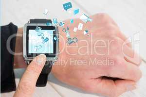 Woman using smartwatch with apps