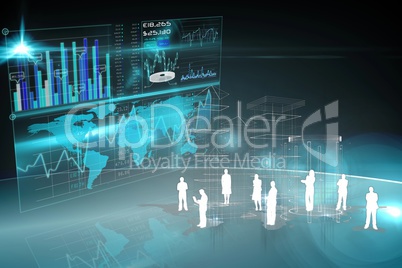 Silhouettes of business people against stock market graphics