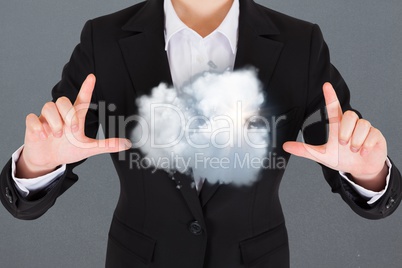 Composite image of a business man with a cloud