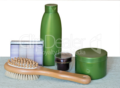 Brush massage and cream for skin care.