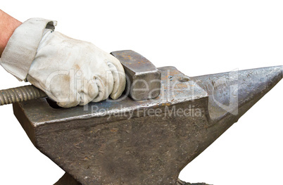 Blacksmith's hammer and anvil on a white background.