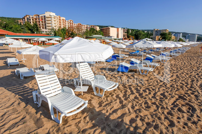 Sunbeds and sun umbrellas on the beach