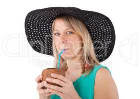 woman drinking coconut cocktail