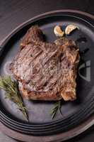 Grilled rare rib steak