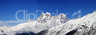 Panoramic view on Mount Ushba in winter at sunny day