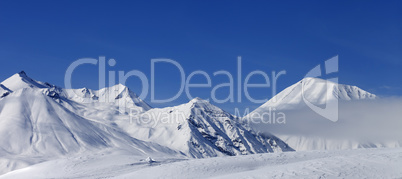 Panoramic view on winter mountains