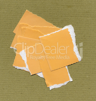 Yellow Torn paper pieces