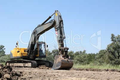 excavator on road construction