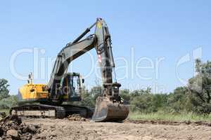 excavator on road construction