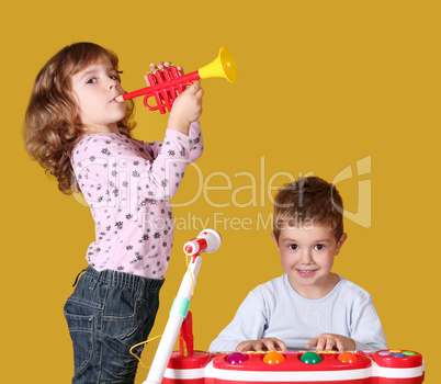 boy and little girl play music