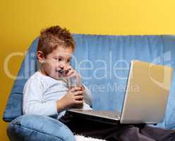 little boy with laptop