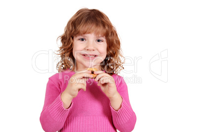 cute little girl eat cookie