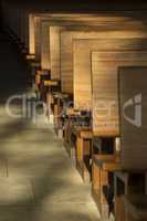 Pews in the morning light.