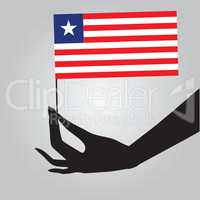 Hand with flag Liberia