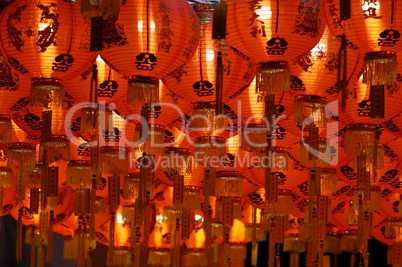 Chinese paper lantern hanging from a ceiling