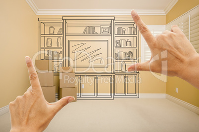 Hands Framing Drawing of Entertainment Unit In Empty Room