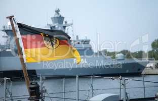 German Bundesdienstflagge blows on a warship