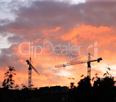 Crane Tower on Sunset Sky Background