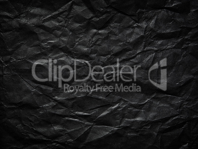 Black crumpled paper as a background