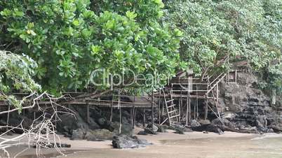 Ao Nang, Krabi Province, Thailand. People walking on a wooden bridge. Pai Plong.