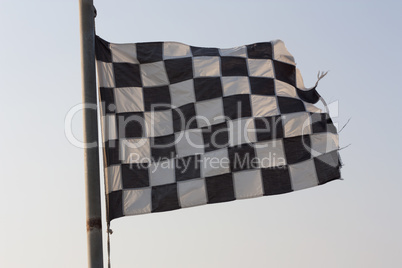 Checkered Flag and blue sky photo