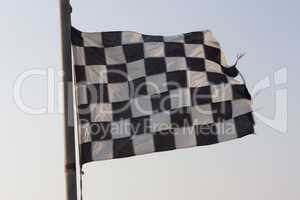 Checkered Flag and blue sky photo