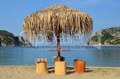 Sun umbrella and stump seats