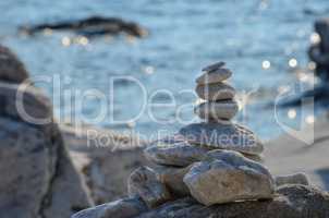 Zen stones on rocky beach