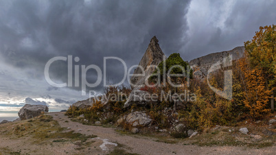 mountain cliff on a cloudy autumn day