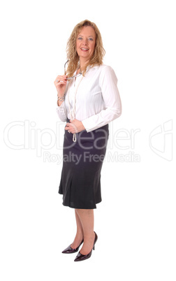 Business woman standing smiling..