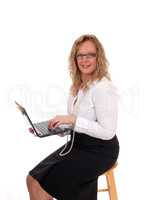 Business woman working with laptop.