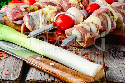 raw meat on skewer