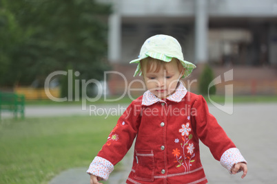 Little girl walking outdoors
