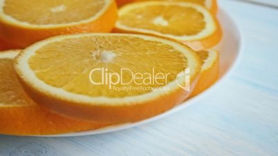 sliced oranges on a plate