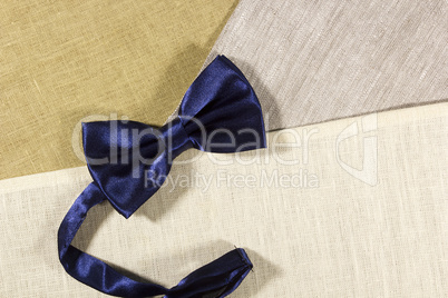 Bow tie on a linen napkin