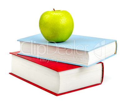 books and apple isolated on white background