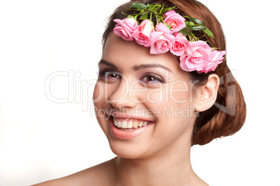 pretty model with flowers on her hair